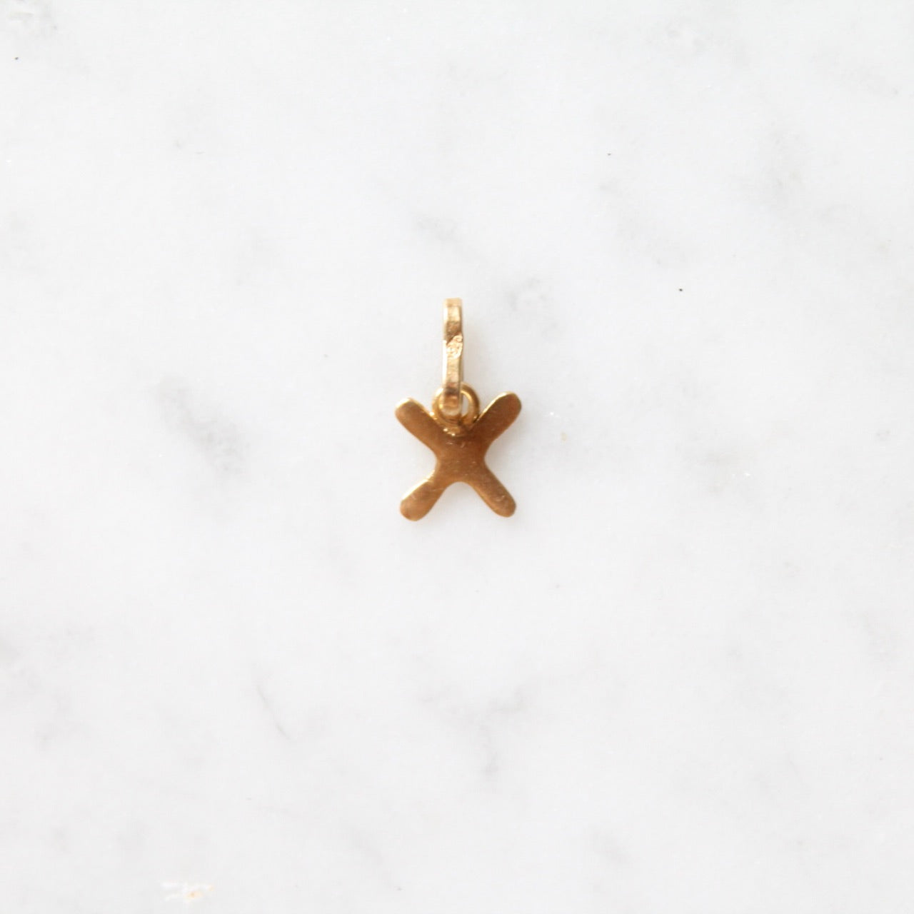 X (Initial) Charm