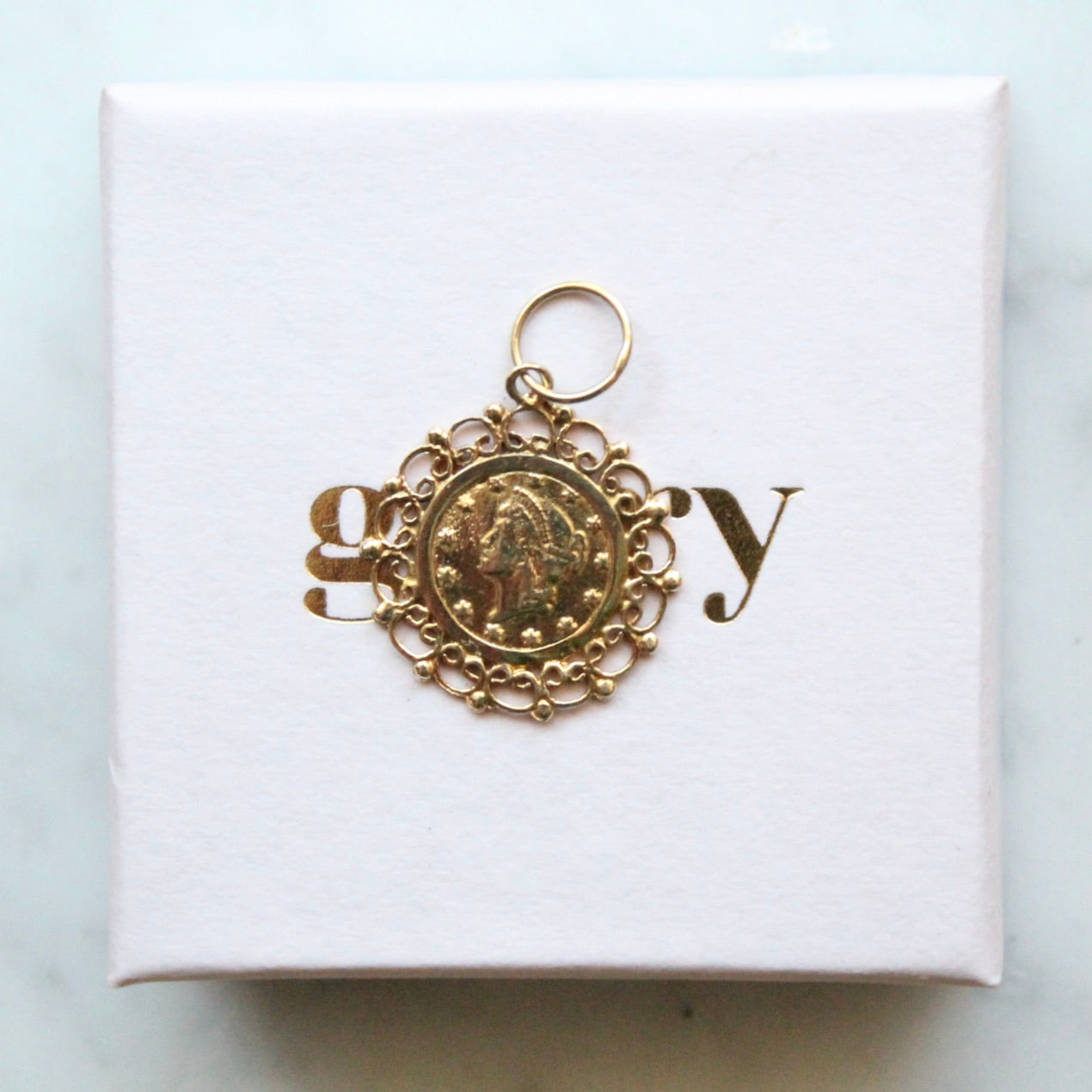 One Dollar Ornate Charm
