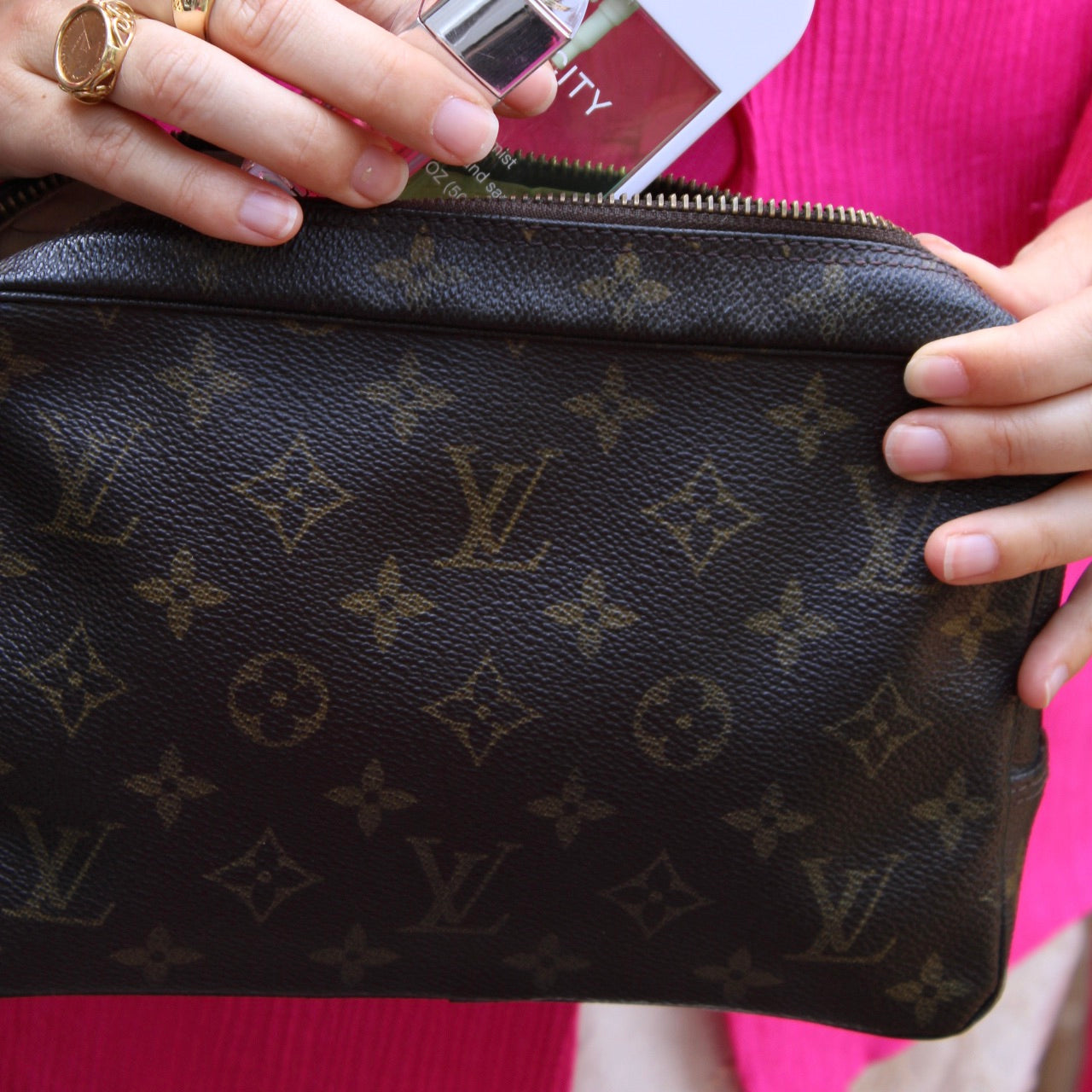 Louis Vuitton Trousse Toilette 23 Clutch
