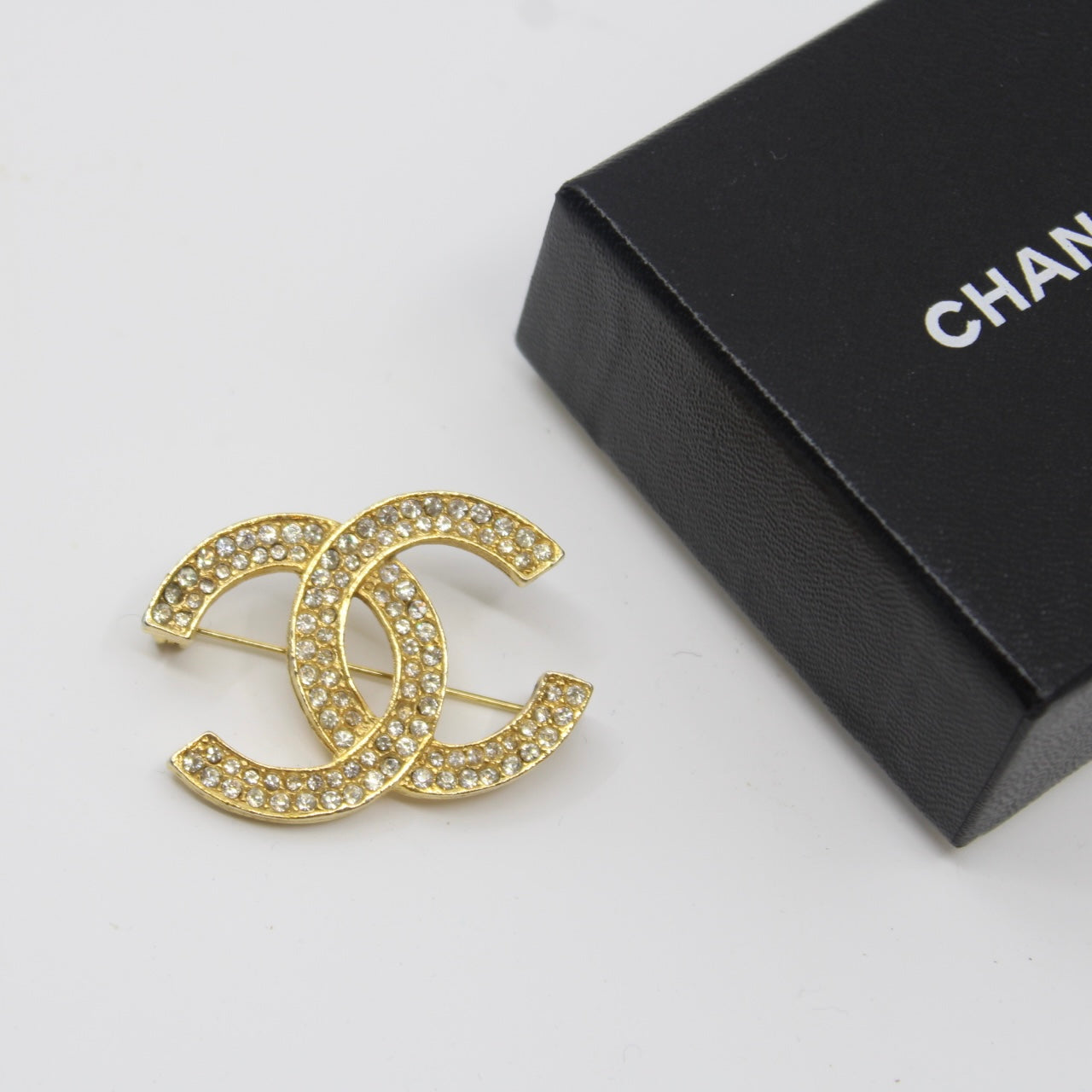 Chanel CC Brooch