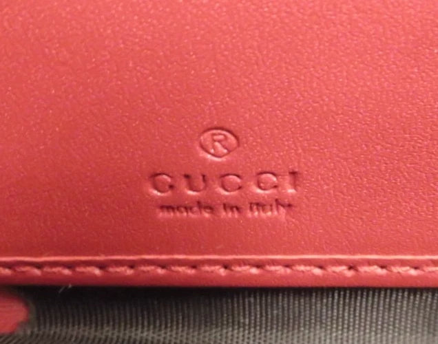 Gucci GG Supreme LOVE Zippy Wallet