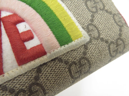 Gucci GG Supreme LOVE Zippy Wallet