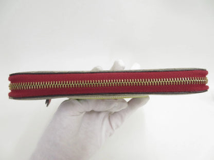 Gucci GG Supreme LOVE Zippy Wallet
