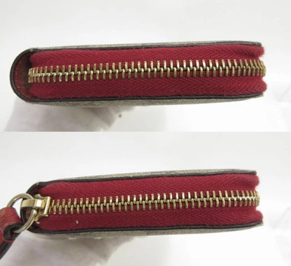 Gucci GG Supreme LOVE Zippy Wallet