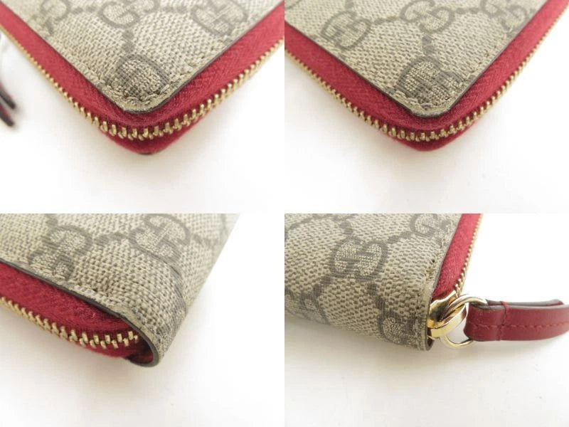 Gucci GG Supreme LOVE Zippy Wallet