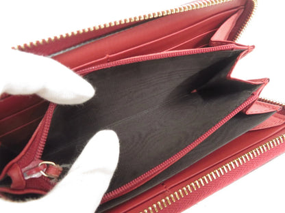 Gucci GG Supreme LOVE Zippy Wallet