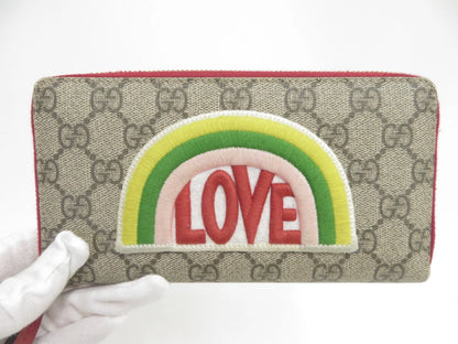 Gucci GG Supreme LOVE Zippy Wallet